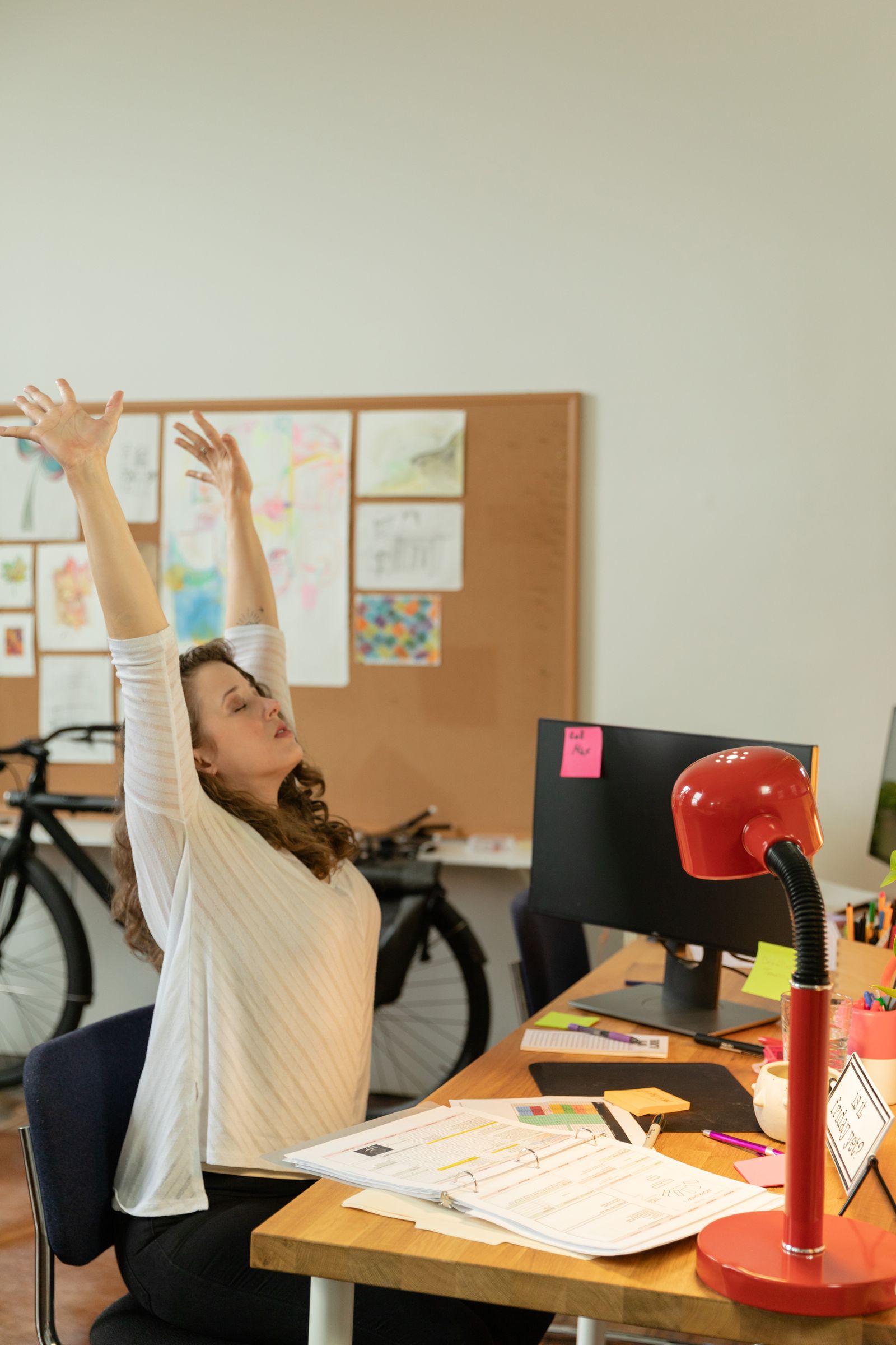 Employee taking a mindful stretch break at their desk